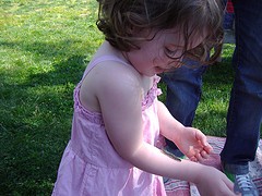 Little Girl with Caterpillar at Earth Day Festival