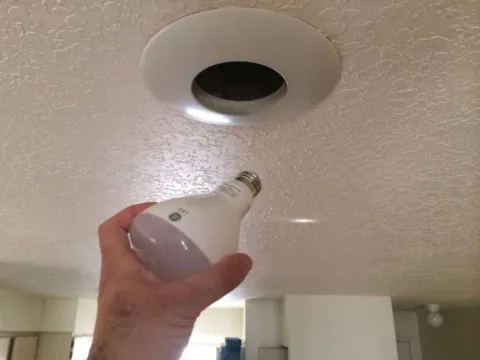Here I'm installing a GE LED flood light in my dining room recessed can fixture, which is hooked up to a traditional dimmer switch. 