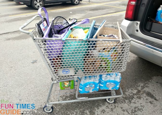 lotus-trolley-bags-with-heavy-items-underneath In addition to the heavy items on the very bottom of the cart, I also had a 12-pack of green tea and a sack of potatoes in the bottom of my cart. The Lotus Trolley Bags fit perfectly in the cart -- right over those 2 items.